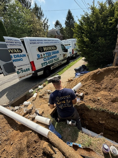 Plumber works on main lines.